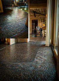 “Stunning mosaic floor” inside the “African Queen,” an extravagant safari-themed home in Springfield, Missouri