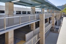 The railing, featuring FPZ-10 woven wire mesh, provides a sense of serenity and security to those entering and leaving the hospital.