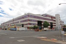 Wide view of Pearl Harbor Naval Shipyard/Intermediate Maintenance Facility's (PHNSY/IMF) Building 155