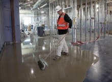 Although self-leveling was not initially built into the installation schedule, the presence of birdbaths in the subfloor necessitated it. 